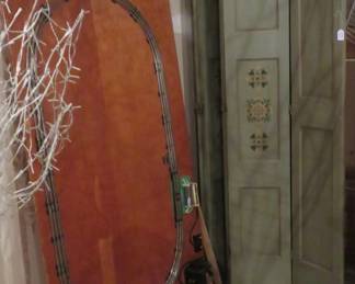 Lionel mounted track and vintage room divider.