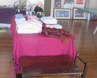 Vintage children's cclothes and table and chairs.