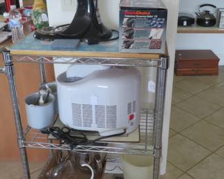 Kitchen Aid and rolling cart.