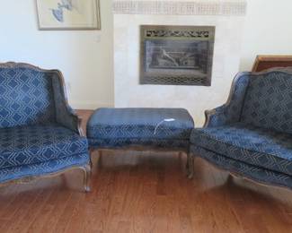 Pair of Guy Chaddock Louis XV Bergere chairs and large ottoman.