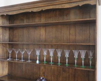 Matching breakfront with three drawers and two doors.