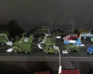 Large selection of vintage Dinky cars and trucks.