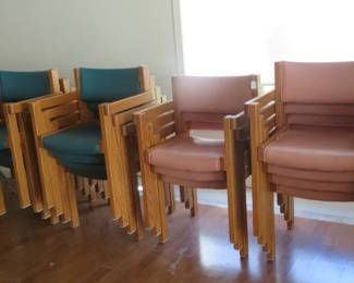 Large collection of MCM leather seat and back stackable chairs.