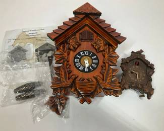 Cuckoo Clock Pair Including Wooden Quartz Style Clock and Vintage Wall Clock