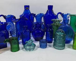 Blue Green and Amber Glass Bottles Pitchers and Decorative Glassware