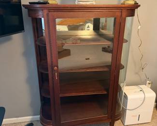 China closet with one piece of missing glass