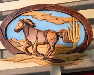 Western art made out of different types of wood
