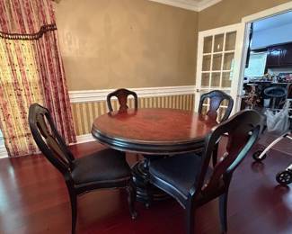 $600 Pulaski 49” dining table with 4 chairs