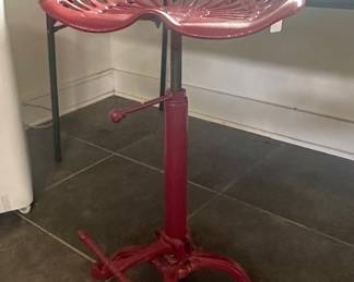 Metal seat - looks like it came off a tractor...