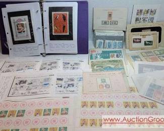 WORLDWIDE STAMPS in a Stock Book with approximately 100 pages More. Souvenir Sheets, Mint Sheets, Blocks, Cancelled, Vintage Modern.