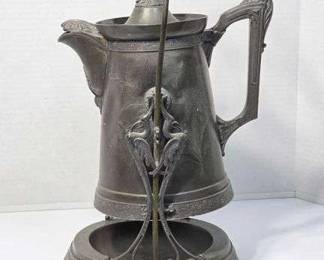 1 Victorian Tilting Ice Water Pitcher with Intricate Designs