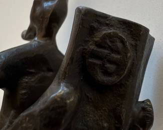 Bronze Figure of a Reclining Person Reading