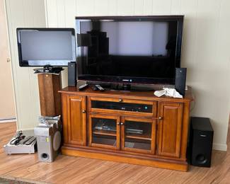 tvs, sound systems, credenza