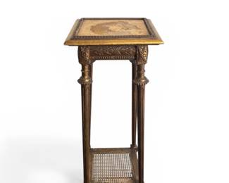 Louis XVI style giltwood fern stand with caned shelf