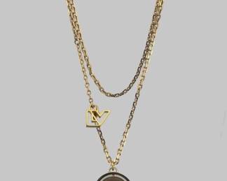 Louis Vuitton gold-tone spinning sphere circus pendant necklace with crystals