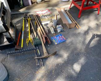 Various tools and a ladder
