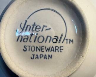 International Stoneware Cup and Saucer Set