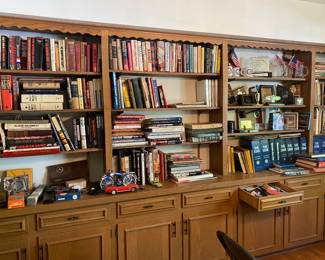50 linear feet of books in several rooms, military, autos, documentaries, Mercedes Benz manuals, magazines