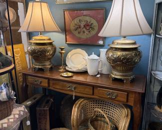 beautiful lamps, desk, framed art