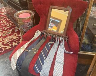 Red arm chair, vintage ties