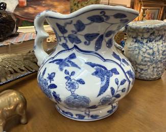 blue and white small decorative pitcher small vintage side table, green floral lamp