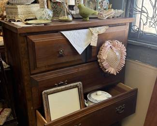 vintage dresser, oil lamps, perfume bottles, birds