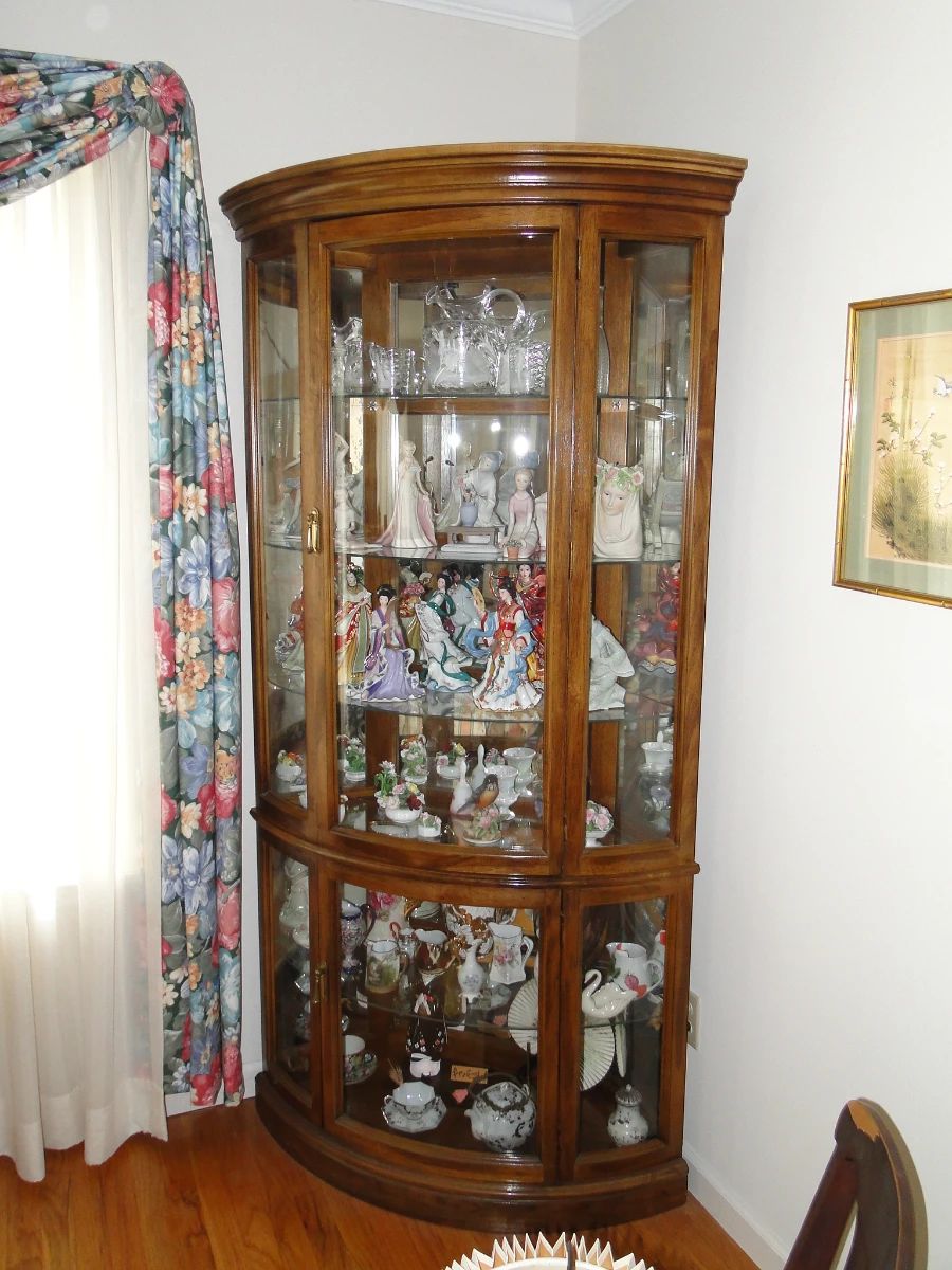 Curio cabinet filled with Bric-a-Brac