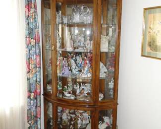 Curio cabinet filled with Bric-a-Brac