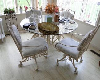 Glass and iron table and chairs