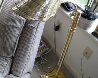 Standing brass shell lamp