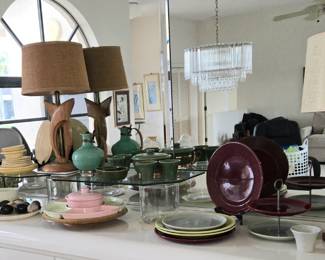 Display of multicolored Bauer pottery Collection and 5 MCM lamps