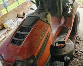 Mower.  Needs new front tires and someone with small engine knowledge.