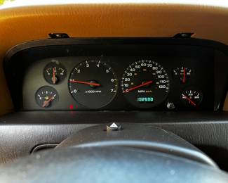 #240	Jeep Grand Cherokee  - 2000 Year Mileage 102590 in Running Condition, Leather Interior (as is drivers Seat  - Taking Bids through April 17th.