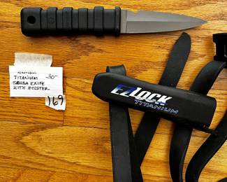 #169	Wenoka Titanium Scub Knife with Holster	 $30.00 