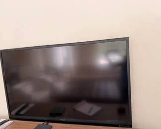 Sharp TV with bracket and remote - Screen size 60"