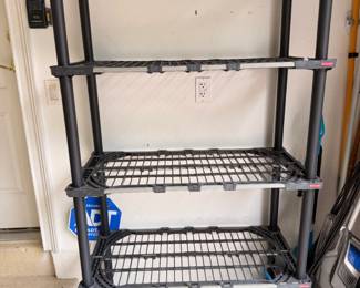 2 black Rubbermaid shelving units - 36 x 18