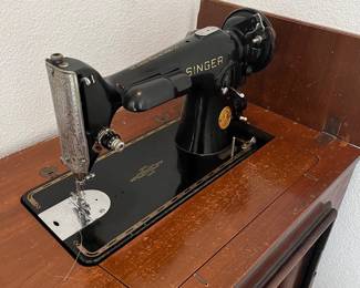 Singer machine in cabinet