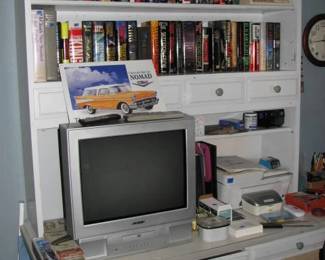 older tv with built in dvd, books and more