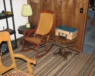 end tables, fishing tackle and a rocker