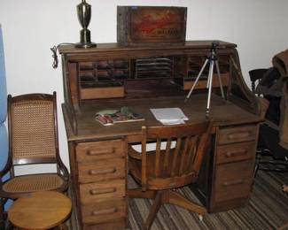 roll top desk, oak office chair, rocking chair beer crate on top of desk