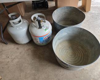 Propane bottles, galvanized tubs