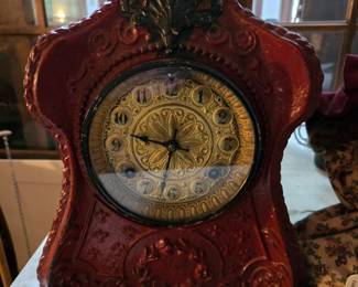 Red metal mantle clock