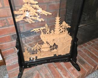 Japanese wood carved art in case on stand