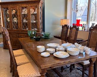 Century Furniture Oak Table 3 x 8“ wide by 7 feet extends to 14 feet two arm chairs, six side chairs leaded glass front China cabinet 76 inches wide sold as a set