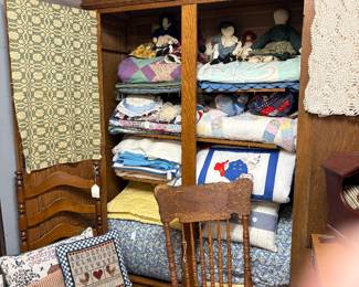 Beautiful Vintage, quilts, oak Prospect chairs, overshot material of different patterns and colors. comforter set.