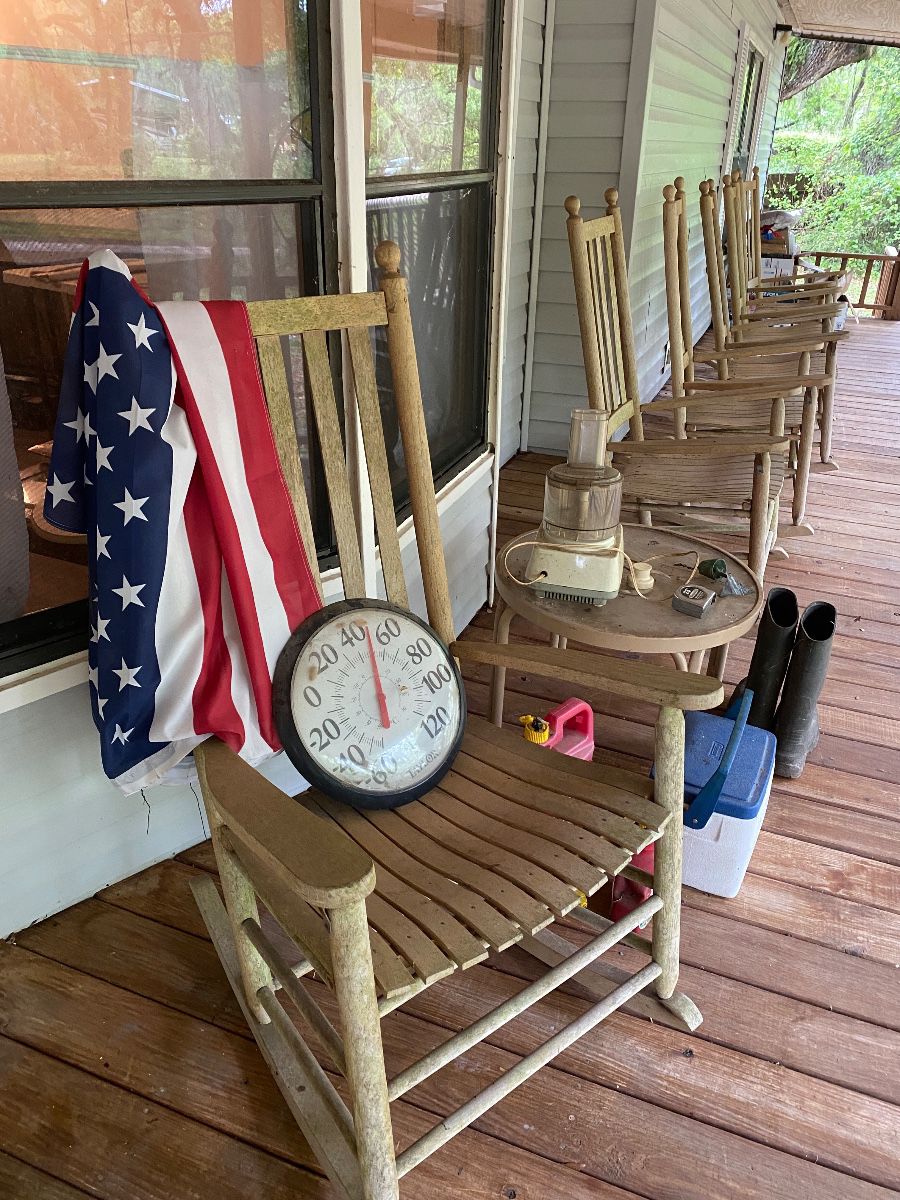 Rocking chairs and items on the porch chair all for sale