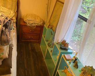 Cute turquoise, painted shelving, and all kinds of fun decor items