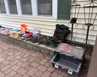 Painting supplies and large toolbox. Metal candle stands