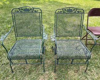 Matching green glider metal chairs 