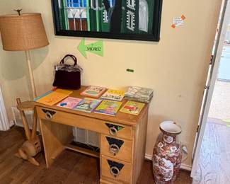 Western themed desk, and lamp. Vintage books, Urn, Velvet purse 